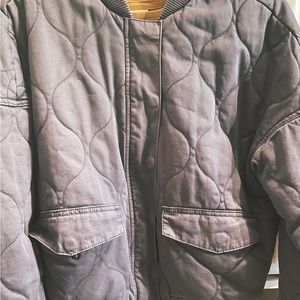 Blue denim bomber jacket — never worn.